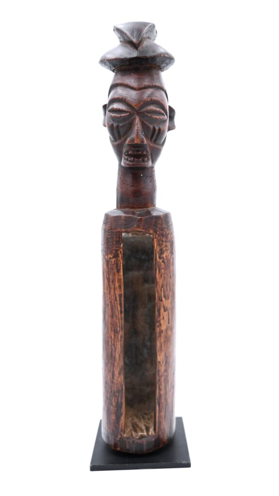 Slit drum with human head