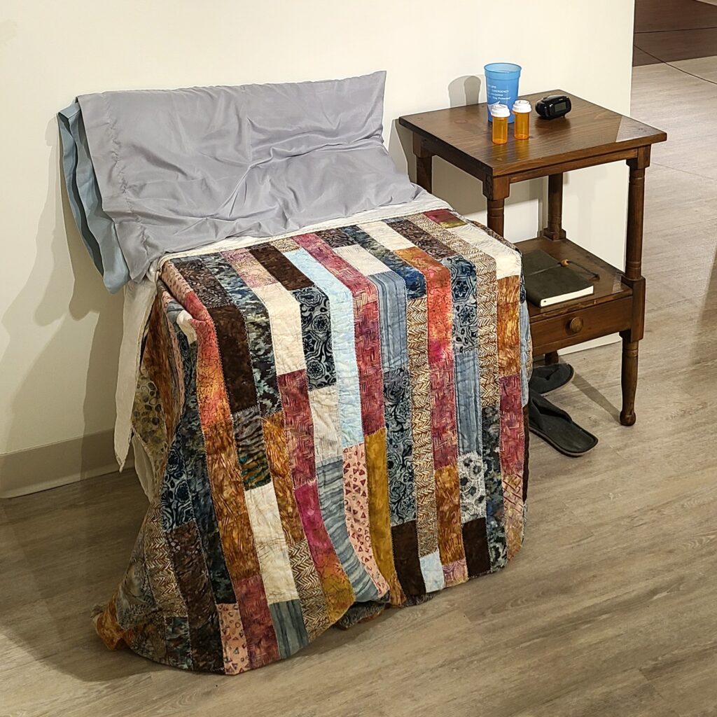 Mock up of a bed and bedside table