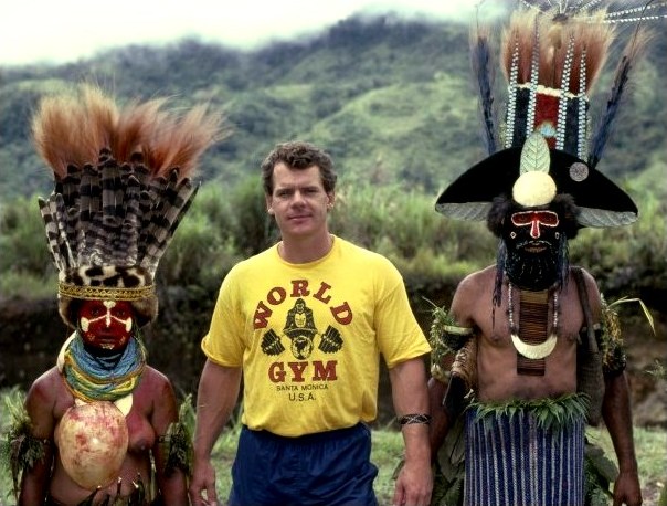 Highlands tribesmen with American rock climber John Long