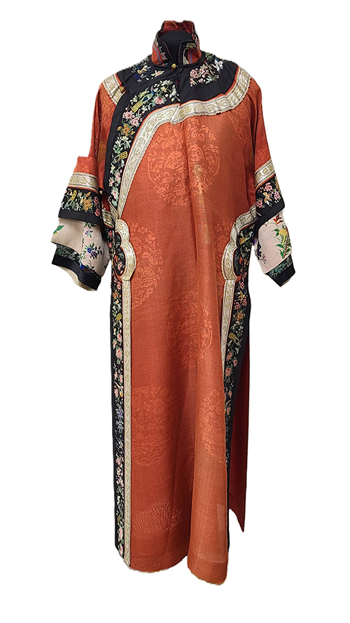 Red silk robe with high collar and black embroidered trim
