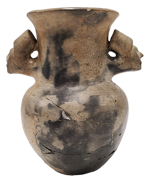 ceramic pot with faces on two sides